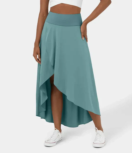 Jupe midi d’été pour femme vert sauge, coupe fluide à ourlet asymétrique, taille haute confortable, parfaite pour un look élégant, léger et tendance.