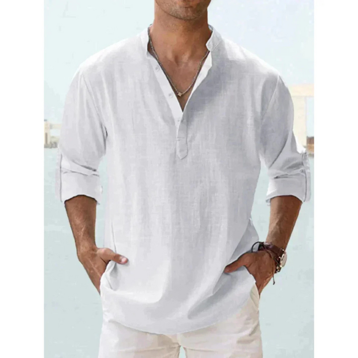 Chemise légère pour homme Ludovic en blanc, avec col Henley et manches longues retroussables. Parfaite pour un look décontracté et élégant, idéale pour l'été et les moments informels.