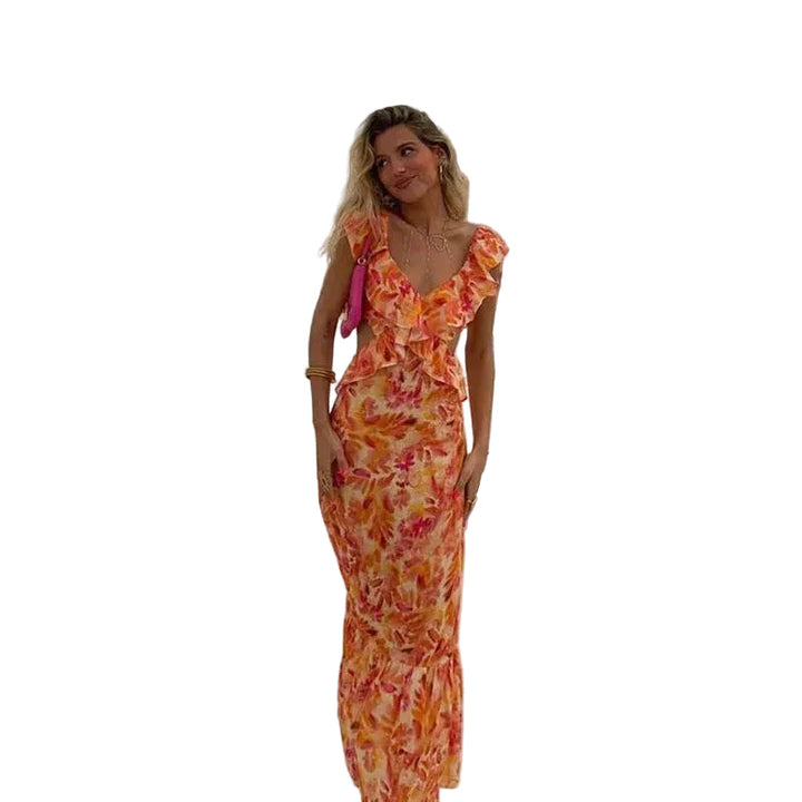 Robe longue à motif floral pour femme, idéale pour l'été. Cette robe à volants, dans des tons chauds de orange et rose, est parfaite pour un look frais et élégant en bord de piscine ou lors de vos sorties estivales.