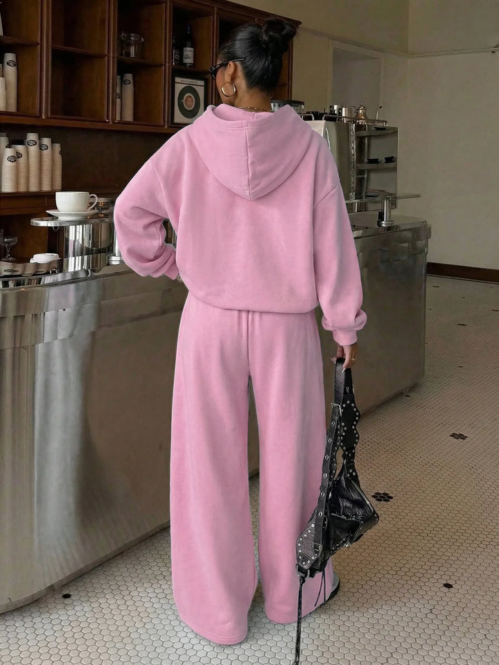 Damen-Trainingsanzug mit kurzem Kapuzenpullover und Hose mit weitem Bein und Taschen