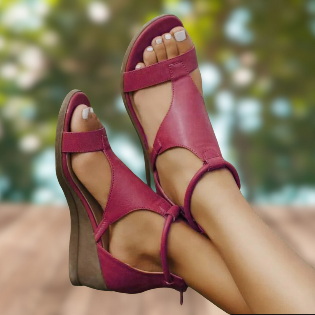 Sandales Vivienne pour femme à style vintage, brides ouvertes et semelle compensée pour un charme rétro estival.