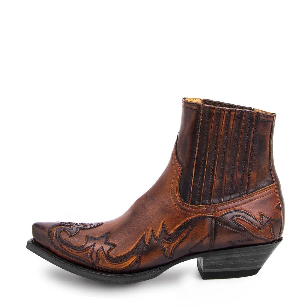 Bottes Domitille pour femme à style western, broderies travaillées et talon haut audacieux pour un look intemporel.