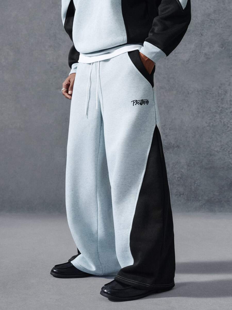Men's two-tone tracksuit set with crew-neck top and wide-leg pants