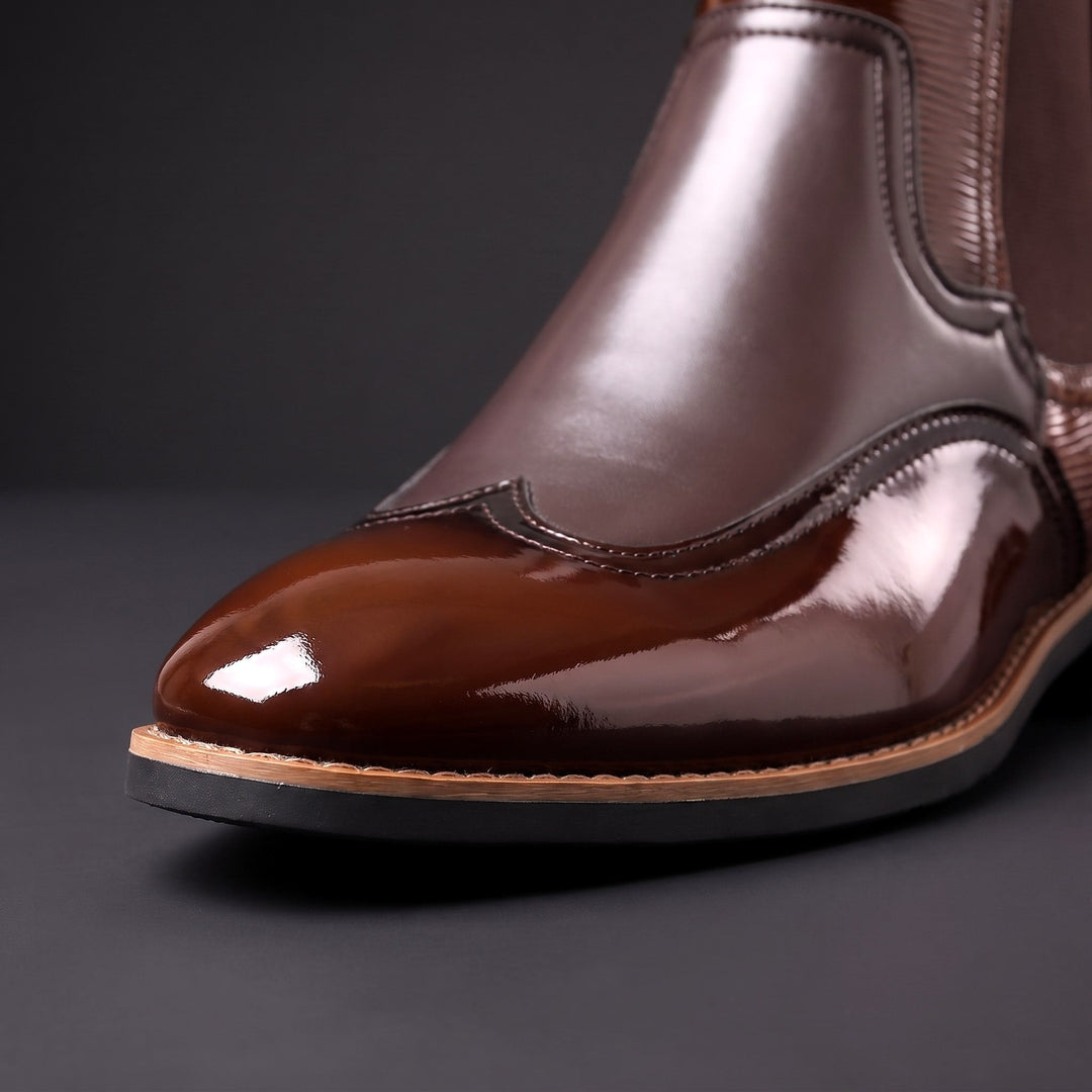 Botas Chelsea de hombre de cuero con elásticos laterales y tiradores