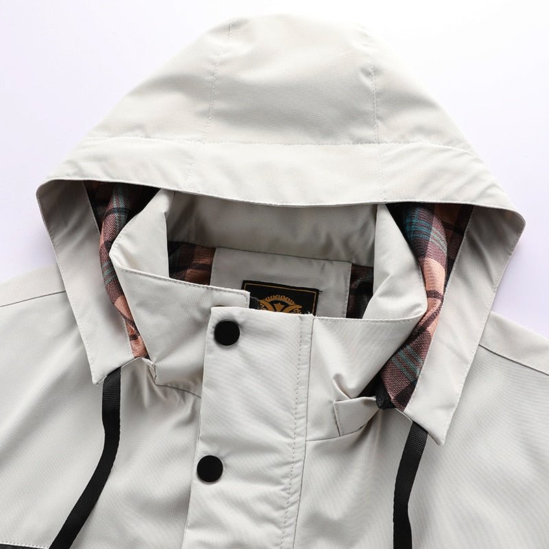 Parka impermeabile con cappuccio e tasche multiple da uomo