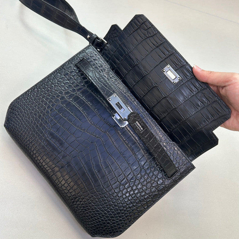 Cartera de mano para mujer de cuero efecto cocodrilo con cierre giratorio y correa de muñeca
