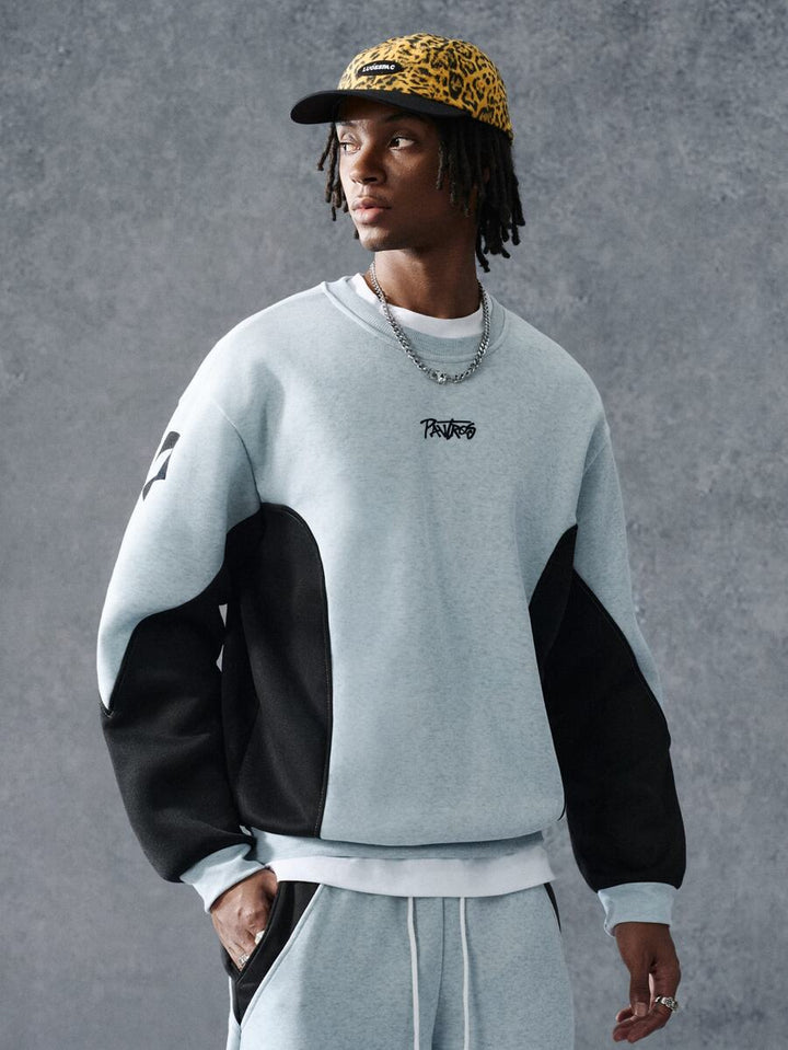 Men's two-tone tracksuit set with crew-neck top and wide-leg pants