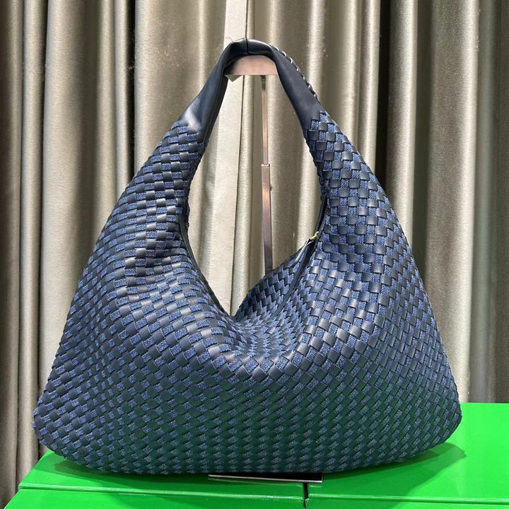 Women's denim and braided leather tote bag with handles