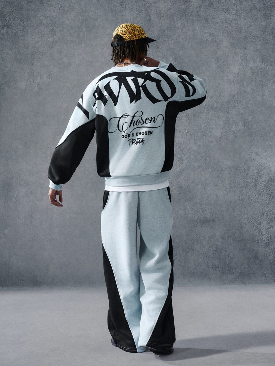 Men's two-tone tracksuit set with crew-neck top and wide-leg pants