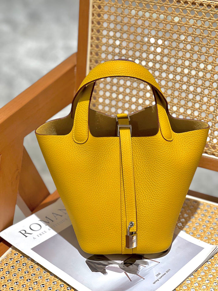 Women's Pebbled Leather Bucket Bag with Handle and Shoulder Strap