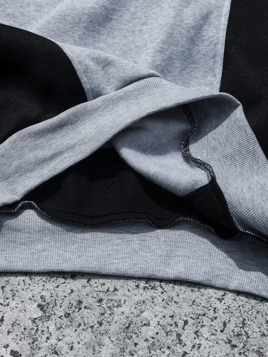 Men's two-tone tracksuit set with crew-neck top and wide-leg pants