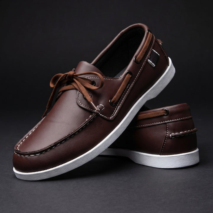 Men's two-tone leather boat shoes with laces and metal eyelets