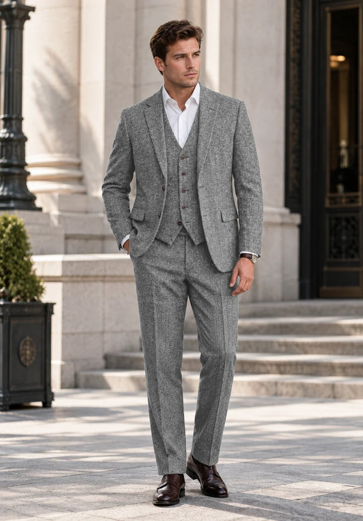 Completo uomo tre pezzi slim fit a spina di pesce con gilet abbottonato