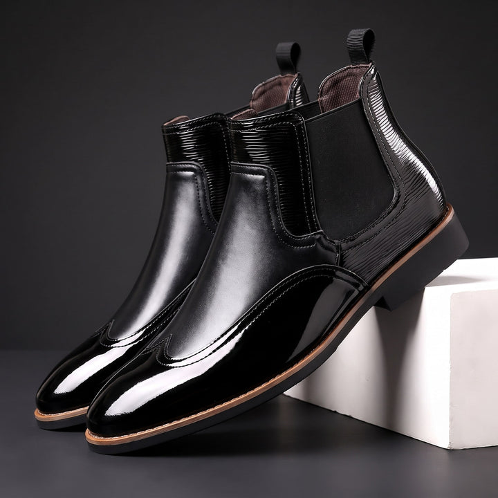 Botas Chelsea de hombre de cuero con elásticos laterales y tiradores