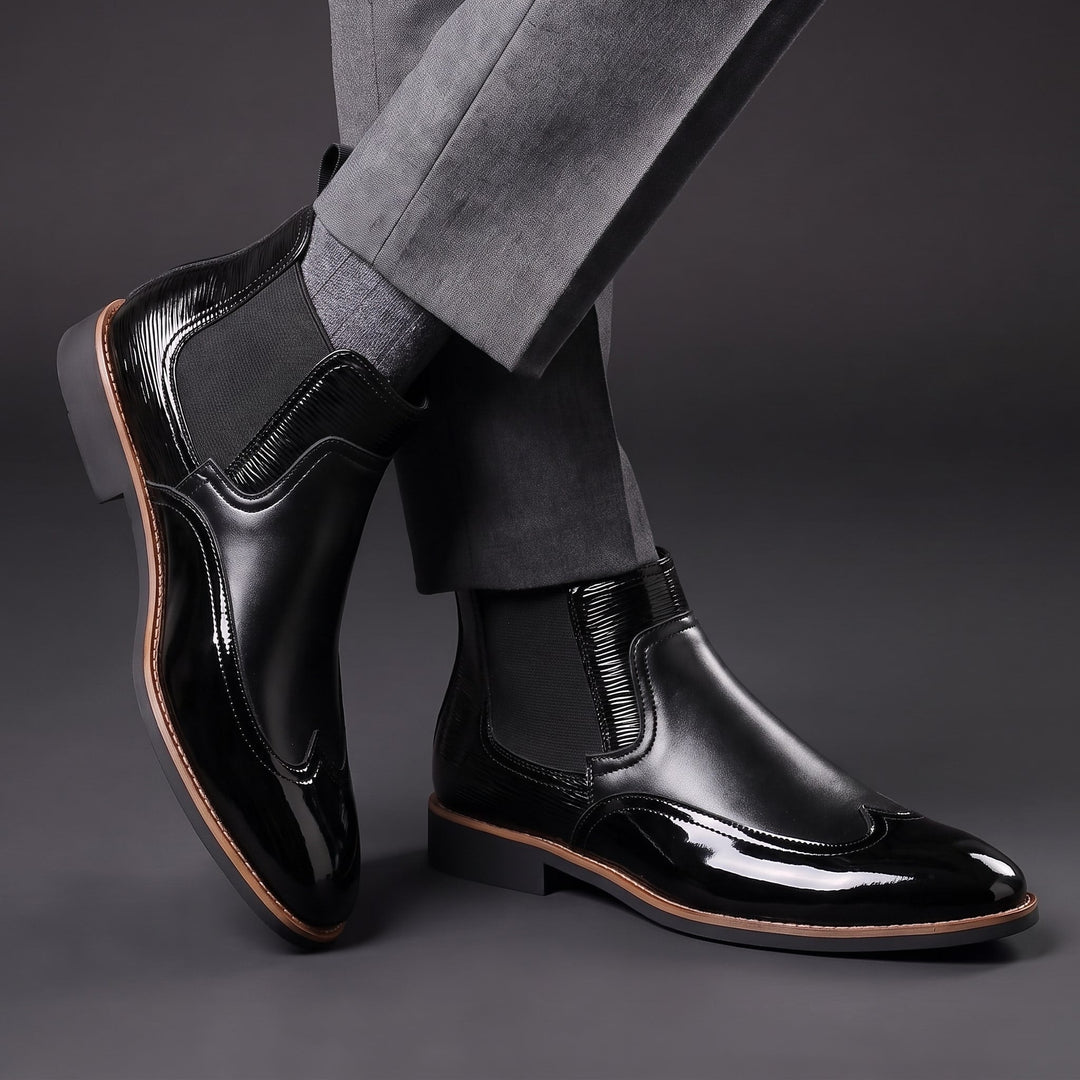 Botas Chelsea de hombre de cuero con elásticos laterales y tiradores