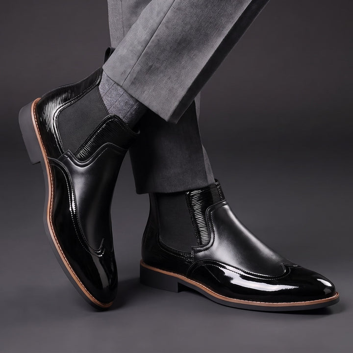 Botas Chelsea de hombre de cuero con elásticos laterales y tiradores