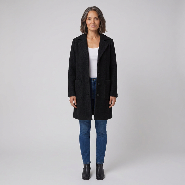 Cappotto lungo da donna monopetto con collo a revers dentellato e chiusura con bottoni