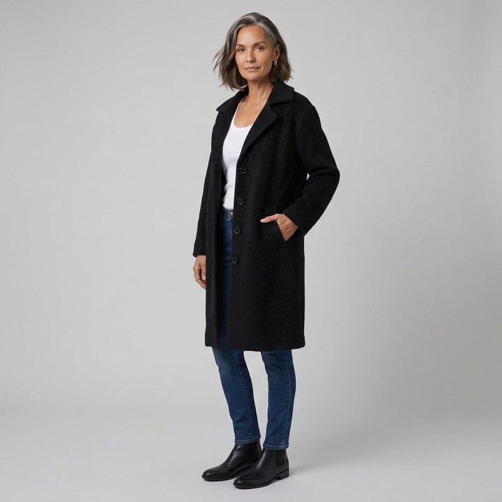 Cappotto lungo da donna monopetto con collo a revers dentellato e chiusura con bottoni
