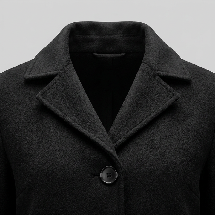 Cappotto lungo da donna monopetto con collo a revers dentellato e chiusura con bottoni