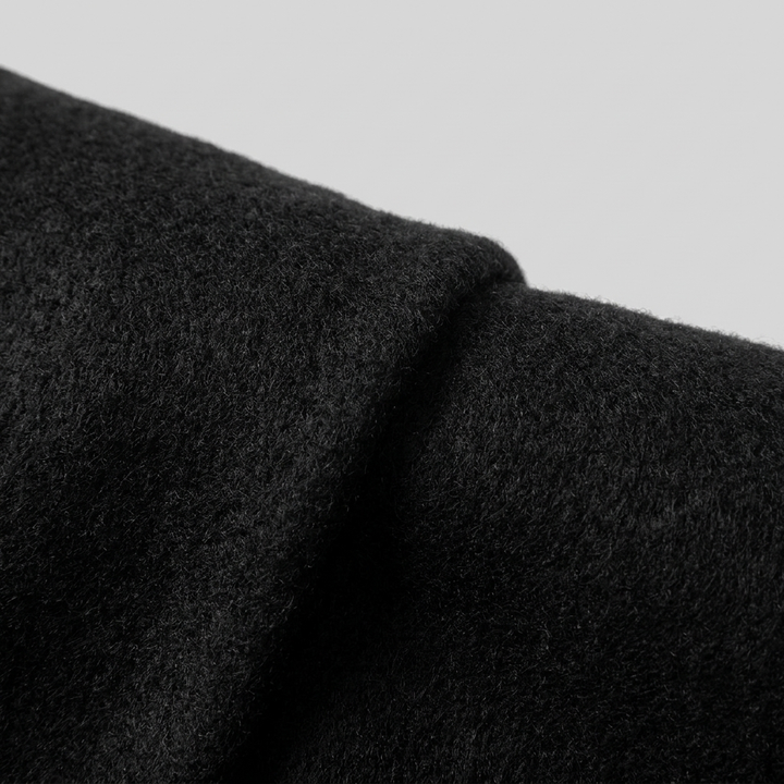 Cappotto lungo da donna monopetto con collo a revers dentellato e chiusura con bottoni