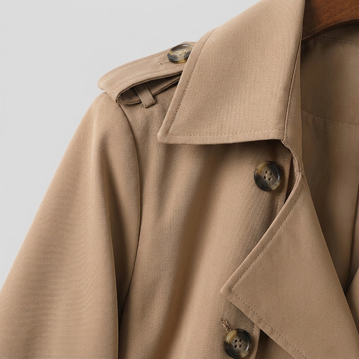 Lange damestrenchcoat met ceintuur, dubbele knopenrij, reverskraag en zakken