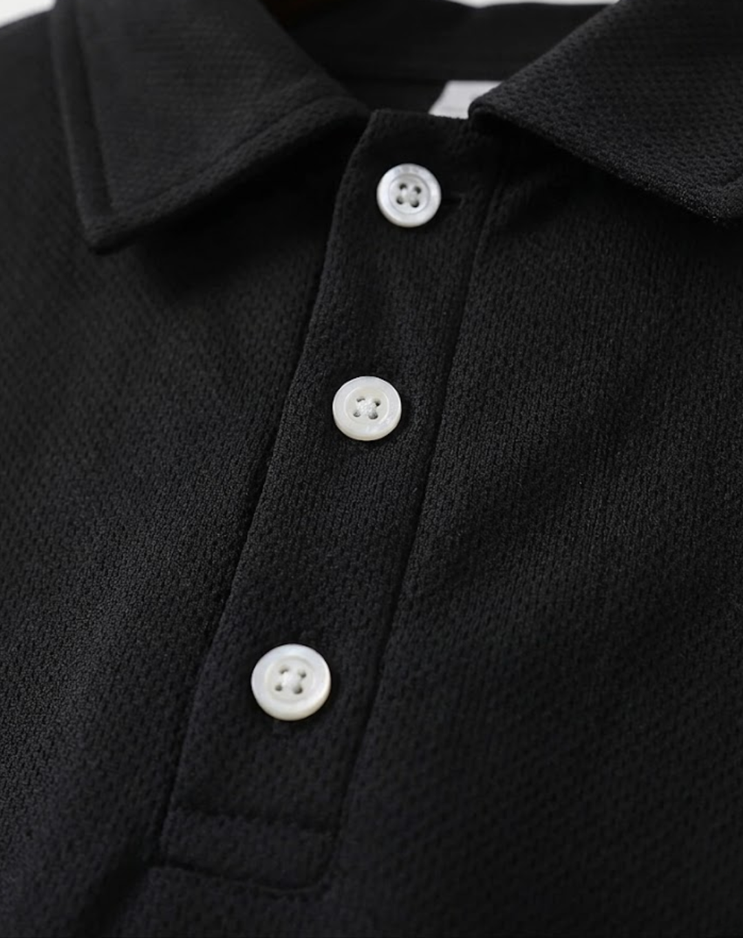 Langarm-Poloshirt für Herren aus Stretch-Strick mit Knopfleiste