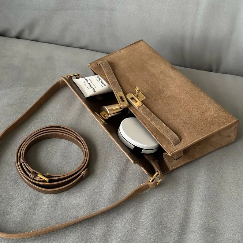 Women's genuine suede pochette bag with flap and turn-lock closure