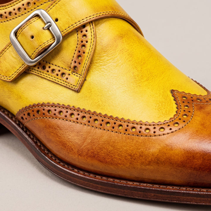 Zweifarbige Herren-Lederschuhe mit einfacher Schnalle und Brogue-Details