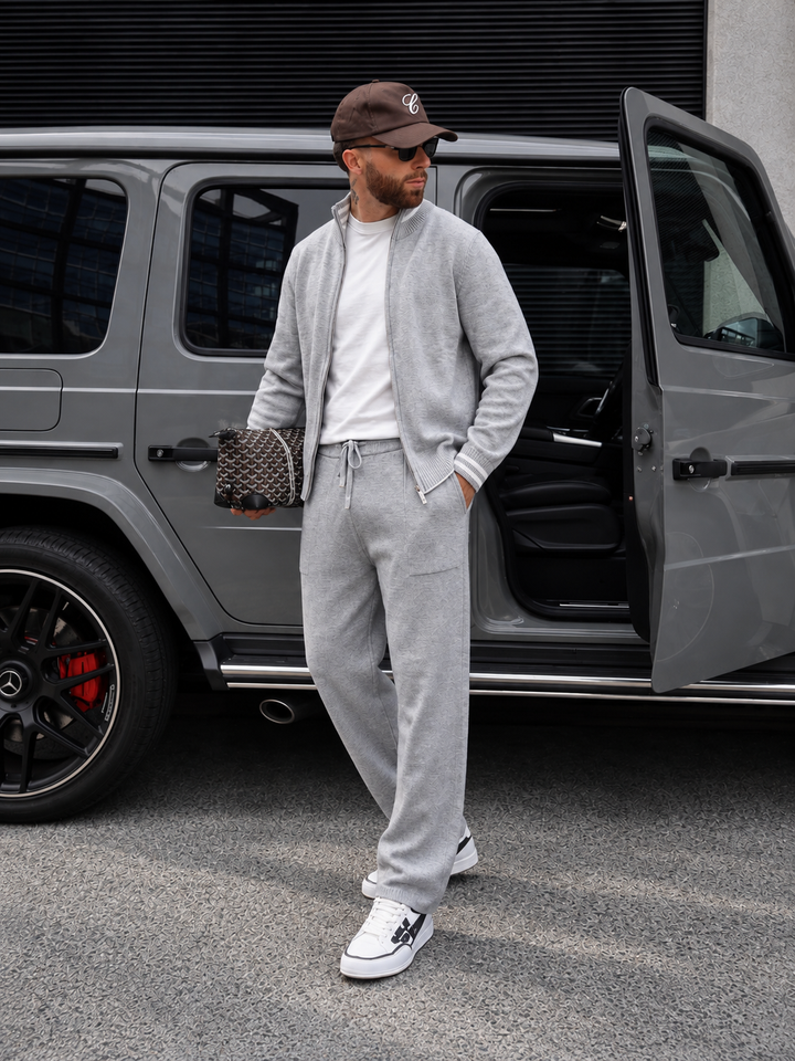 Completo in maglia da uomo con giacca con zip e collo alto e pantaloni a gamba dritta