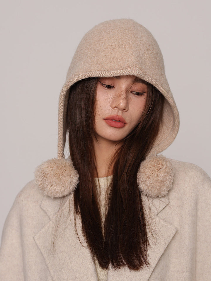 Cappuccio da donna in maglia di pura lana – lacci con pompon