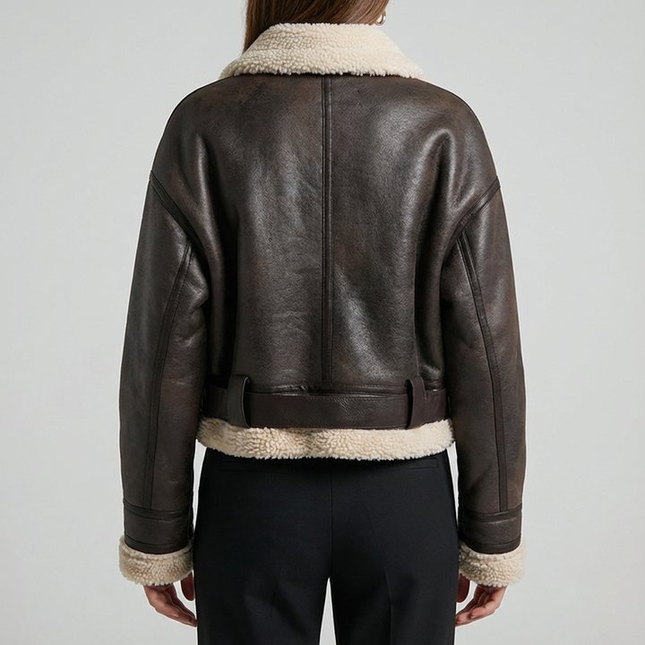 Women's genuine lambskin leather jacket in black with a faux fur collar and belt