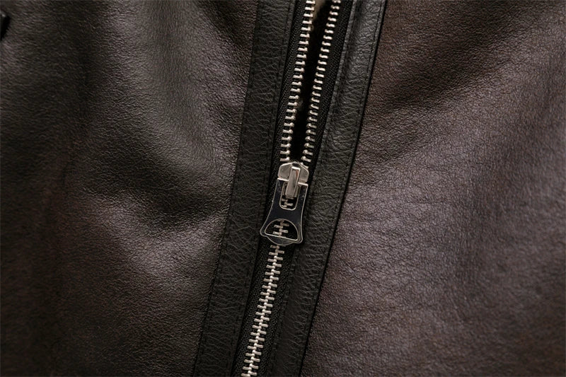 Women's genuine lambskin leather jacket in black with a faux fur collar and belt