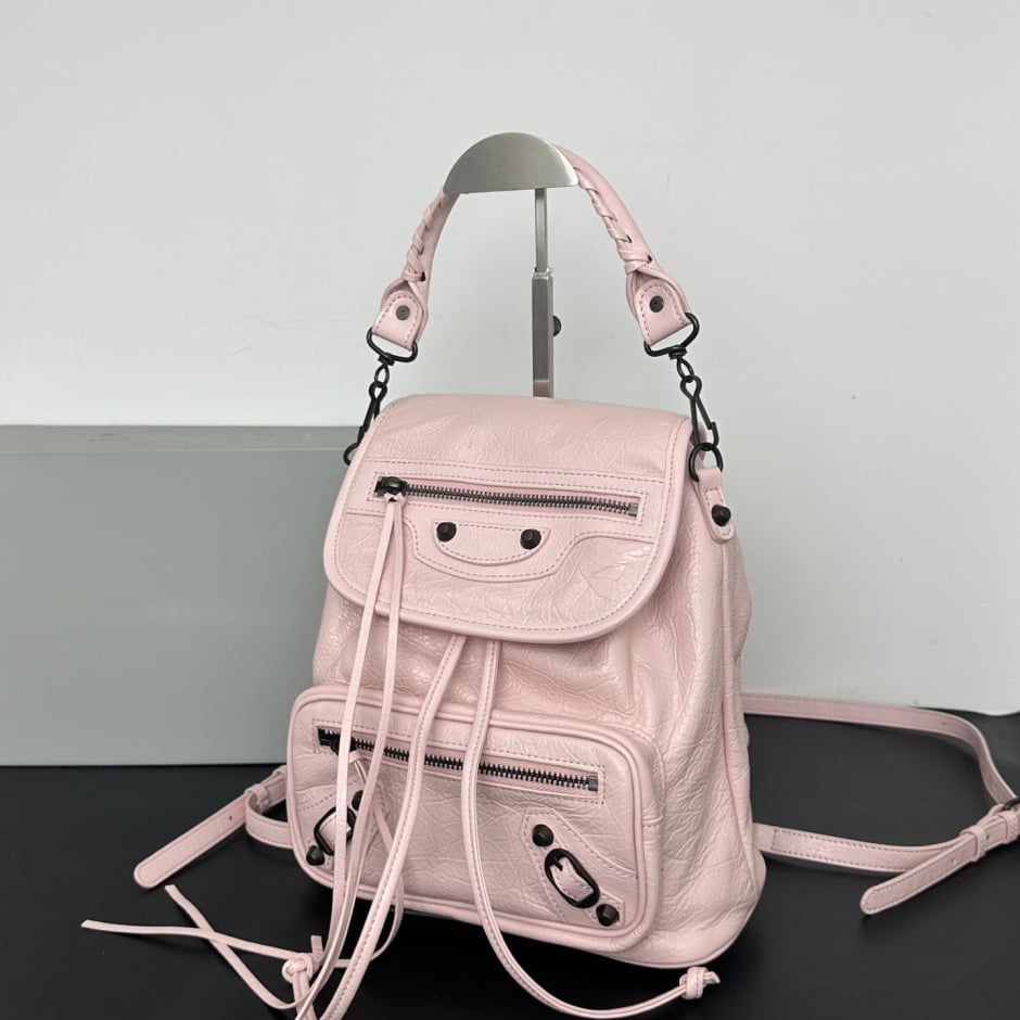 Women's Leather Backpack with Studs, Flap, and Zippered Pockets