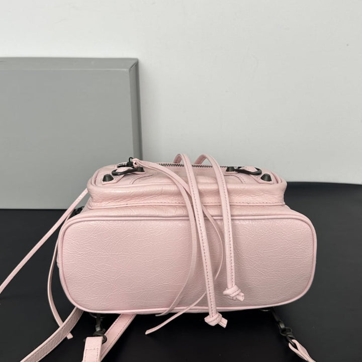 Women's Leather Backpack with Studs, Flap, and Zippered Pockets