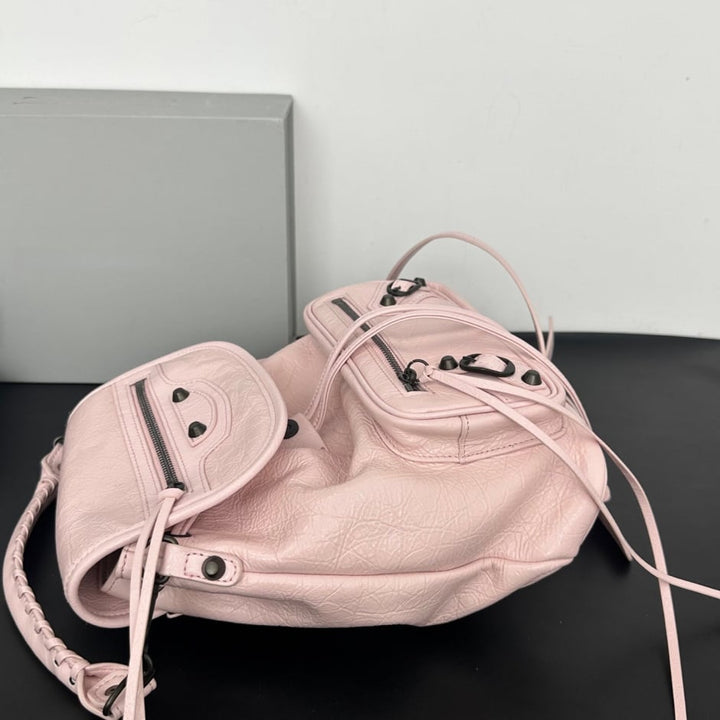 Women's Leather Backpack with Studs, Flap, and Zippered Pockets