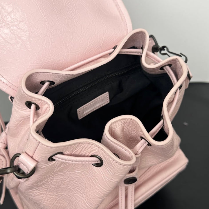 Women's Leather Backpack with Studs, Flap, and Zippered Pockets