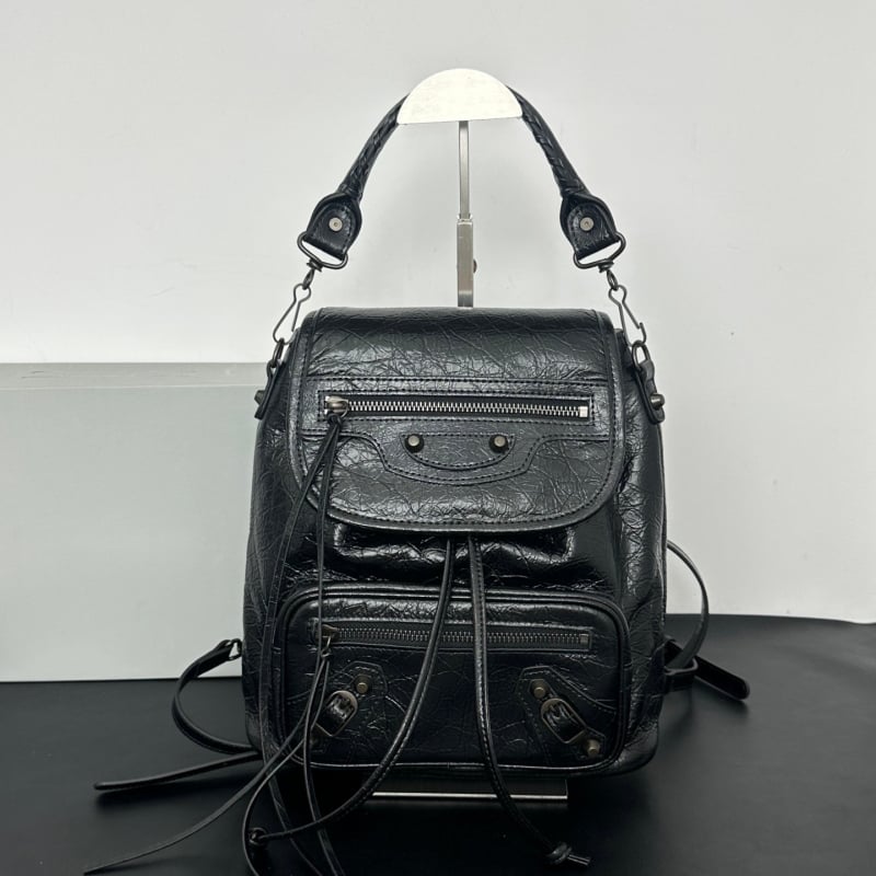 Women's Leather Backpack with Studs, Flap, and Zippered Pockets
