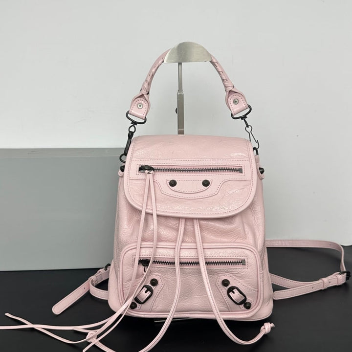 Women's Leather Backpack with Studs, Flap, and Zippered Pockets