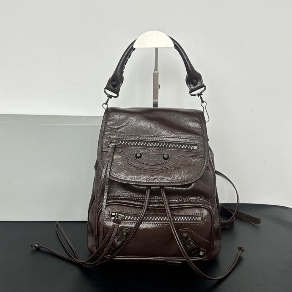 Women's Leather Backpack with Studs, Flap, and Zippered Pockets