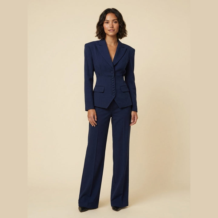 Damespak met getailleerde blazer en wijde pantalon met plooien