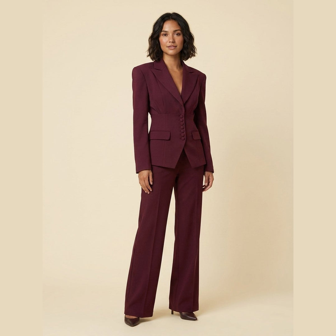 Damespak met getailleerde blazer en wijde pantalon met plooien