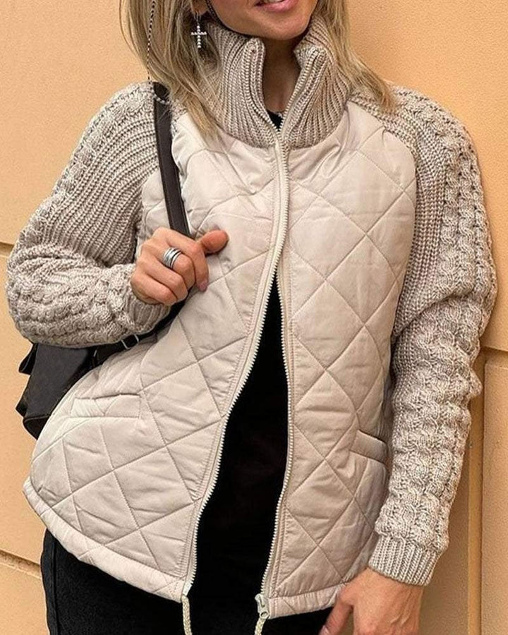 Giacca trapuntata da donna con maniche in maglia e collo alto