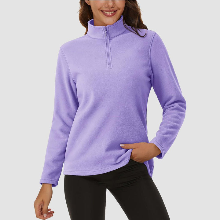 Pile da donna con collo alto e mezza zip
