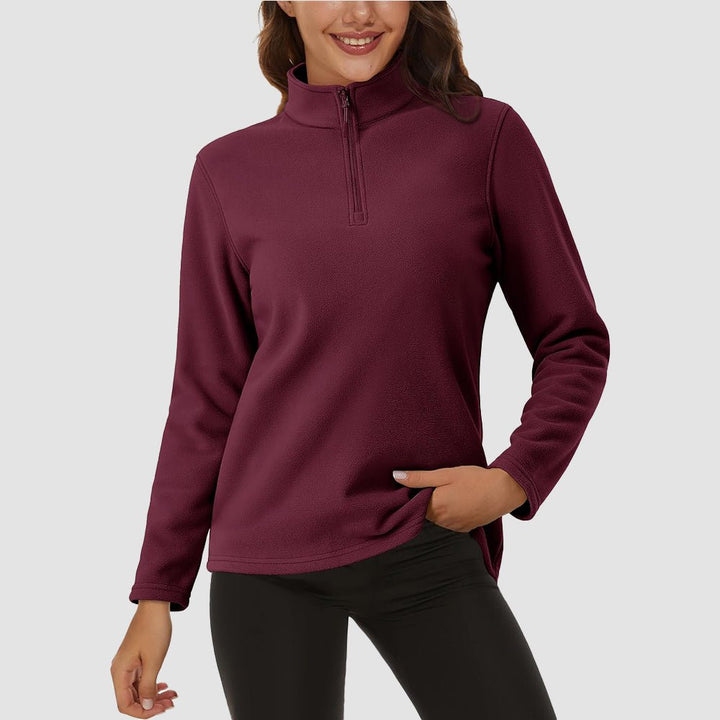 Pile da donna con collo alto e mezza zip