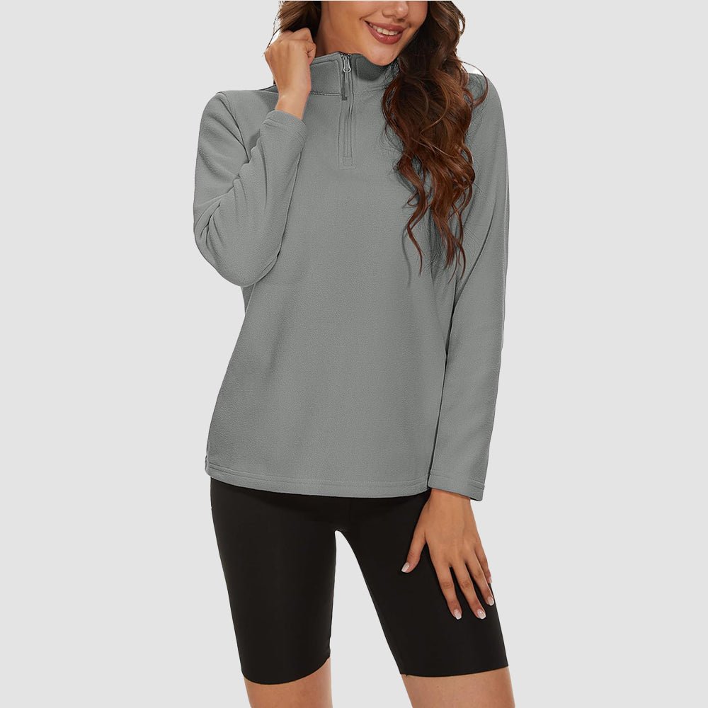 Pile da donna con collo alto e mezza zip