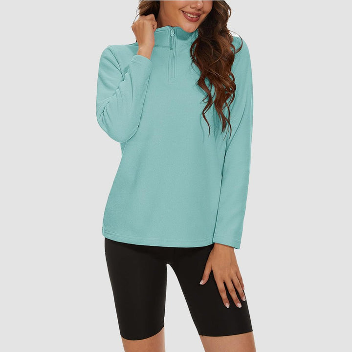 Pile da donna con collo alto e mezza zip