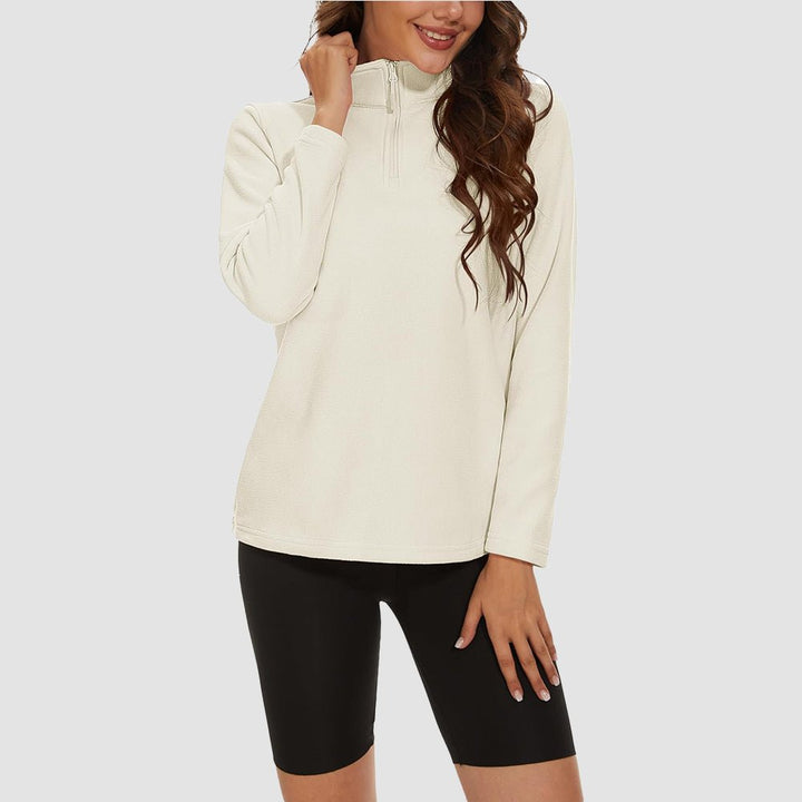Pile da donna con collo alto e mezza zip