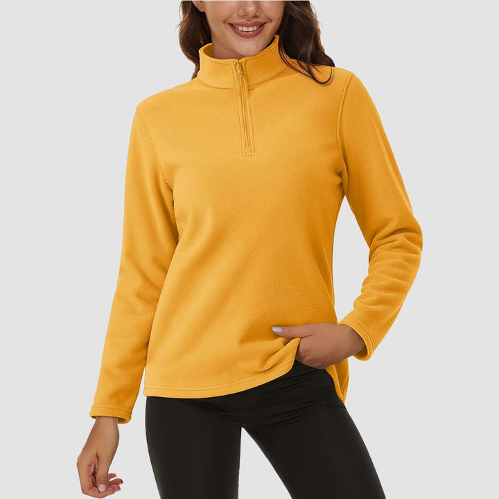 Pile da donna con collo alto e mezza zip
