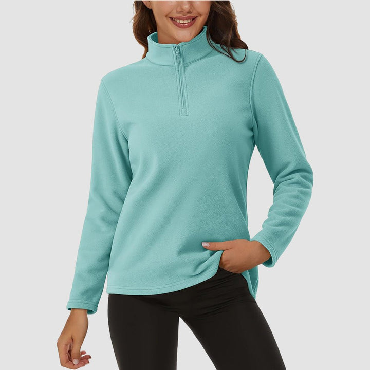 Pile da donna con collo alto e mezza zip
