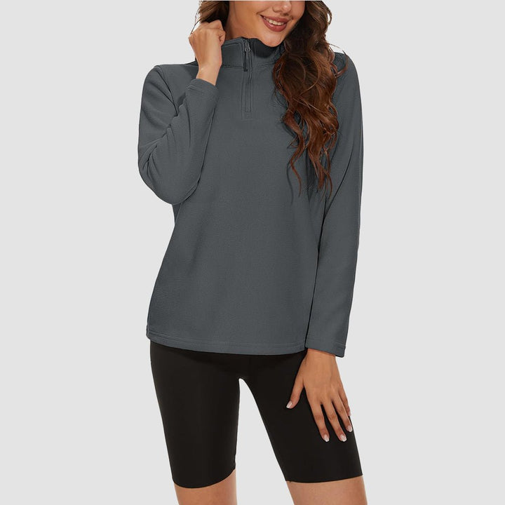 Pile da donna con collo alto e mezza zip
